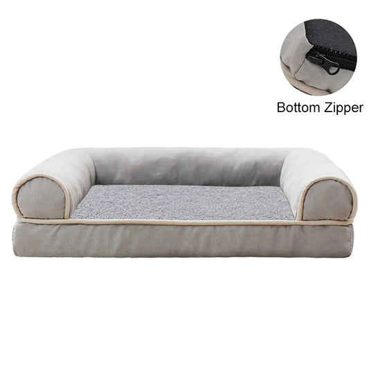 Gray pet bed with beige trim on a white background, showing a close-up of the bottom zipper.