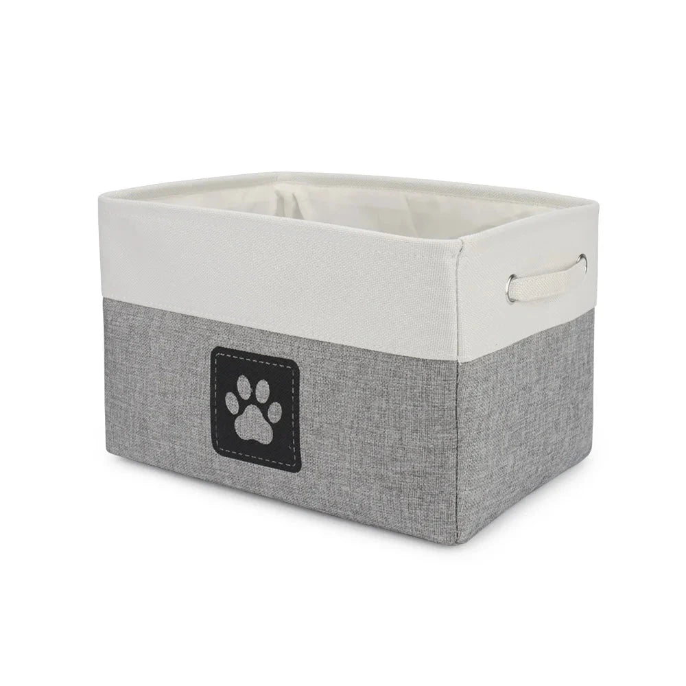 Gray storage bin with a white top and paw print design on a white background
