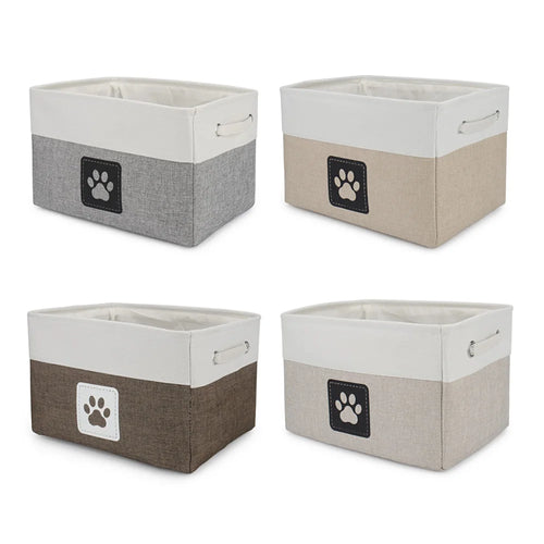 Four storage bins with paw print designs on a white background