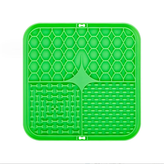 Green silicone mat with textured design on a white background