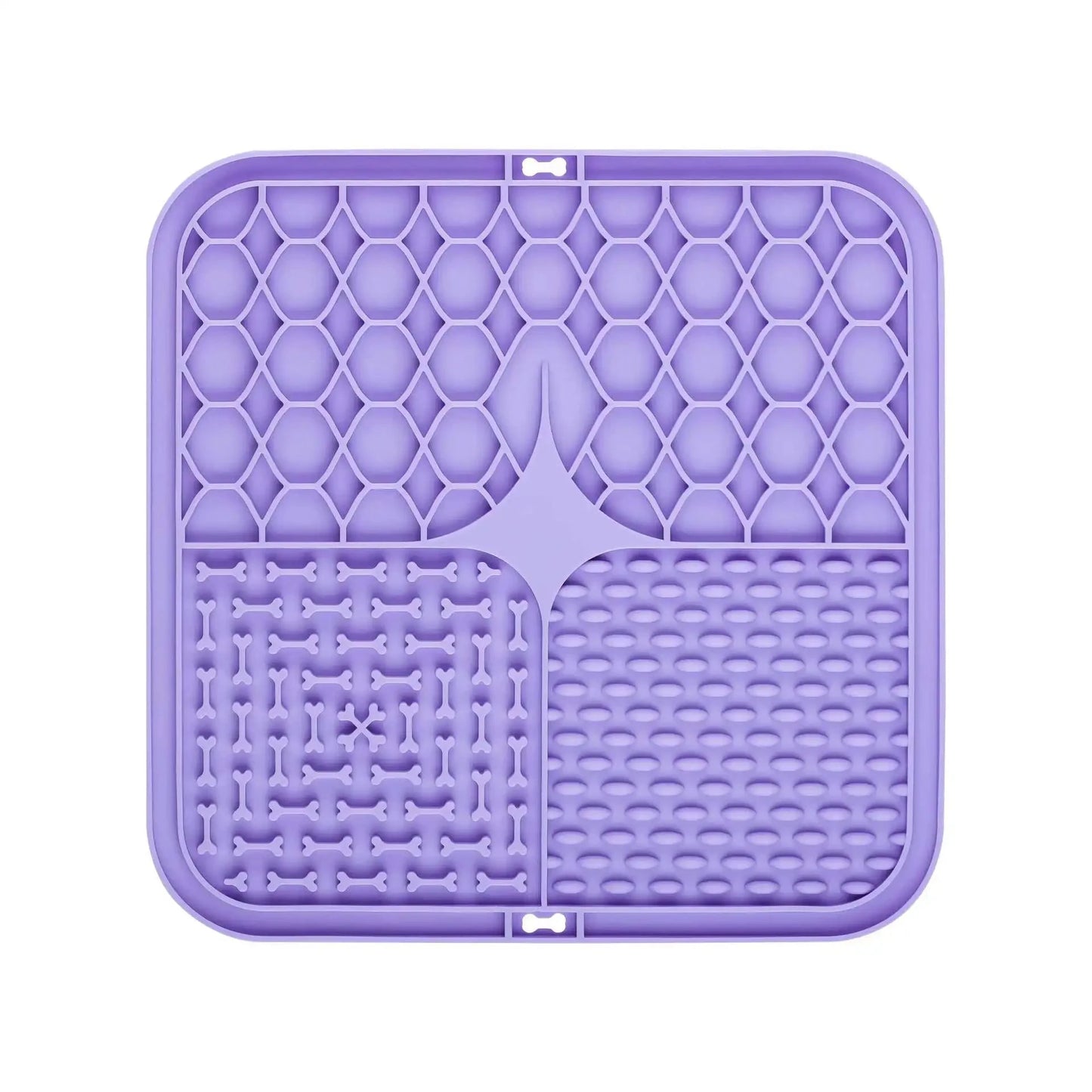 Purple silicone mat with textured design on a white background