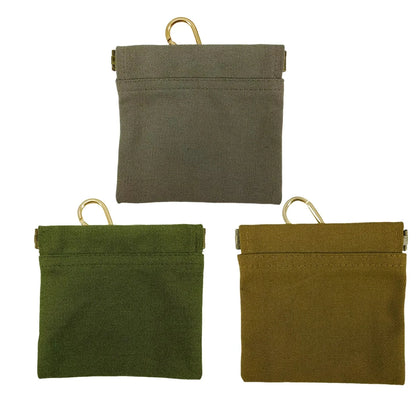 Three tactical pouches in different colors on a white background