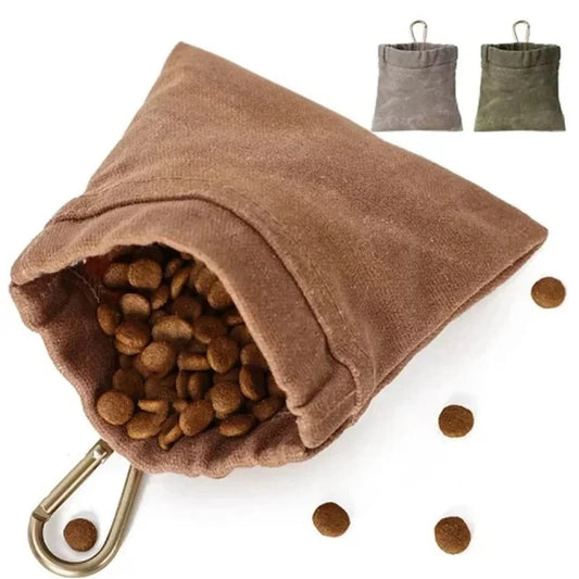 Brown fabric bag filled with pet food, with additional bags in gray and green in the background.