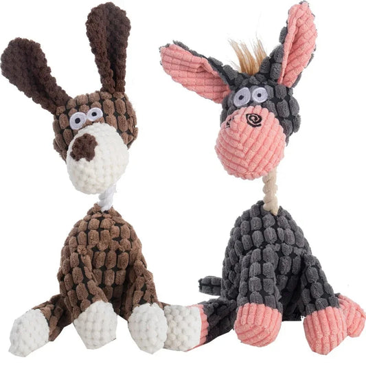 Two knitted donkey toys, one brown and white, the other gray and pink, on a white background.