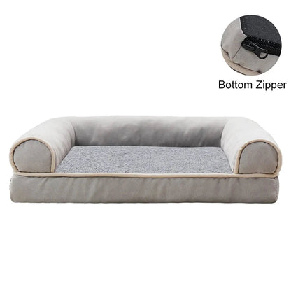 Gray pet bed with beige trim on a white background, showing a close-up of the bottom zipper.