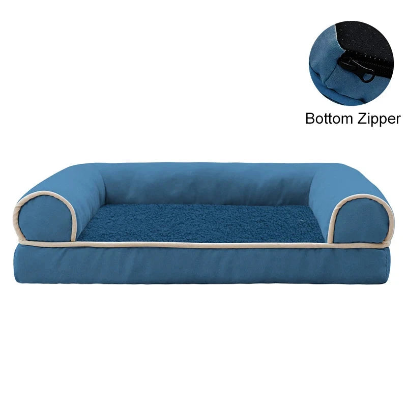 Blue pet bed with beige trim on a white background, showing a close-up of the bottom zipper.