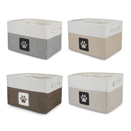 Four storage bins with paw print designs on a white background